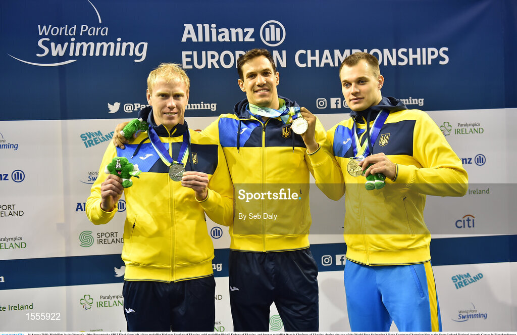 14 August 2018; Medallists in the Women's 100m Breaststroke SB12 Final, from left, silver medallist Maksym Veraksa of Ukraine, gold medallist Oleksii Fedyna of Ukraine, and bronze medallist Danylo Chufarov of Ukraine, during day two of the World Para Swimming Allianz European Championships at the Sport Ireland National Aquatic Centre in Blanchardstown, Dublin. Photo by Seb Daly/Sportsfile