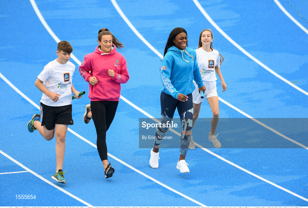15 August 2018; Ireland’s World Championships Relay Heroes Ciara Neville, Gina Akpe Moses and Patience Jumbo Gula at the launch Aldi Community Games’ National Festival. Pictured at the launch is Ciara Neville and Patience Jumbo Gula with Josh Bowland, age 12, from Crecora Co. Limerick, and Emma Moroney, age 14, from Shanagolden Co. Limerick, at the new state of the art athletics track in UL, Limerick. Photo by Eóin Noonan/Sportsfile