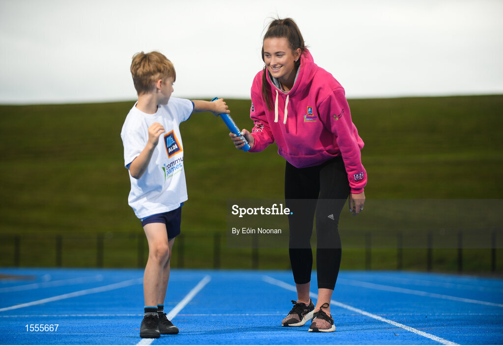 15 August 2018; Ireland’s World Championships Relay Heroes Ciara Neville, Gina Akpe Moses and Patience Jumbo Gula at the launch Aldi Community Games’ National Festival. Pictured at the launch is Ciara Neville with Elliot O'Connoll, age 7, from Raheen Co. Limerick at the new state of the art athletics track in UL, Limerick. Photo by Eóin Noonan/Sportsfile