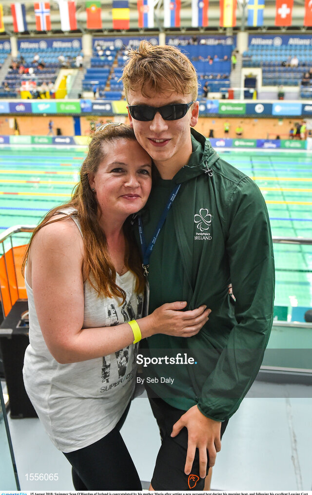 15 August 2018; Swimmer Sean O'Riordan of Ireland is congratulated by his mother Maria after setting a new personal best during his morning heat, and following his excellent Leaving Cert results, during day three of the World Para Swimming Allianz European Championships at the Sport Ireland National Aquatic Centre in Blanchardstown, Dublin. Photo by Seb Daly/Sportsfile