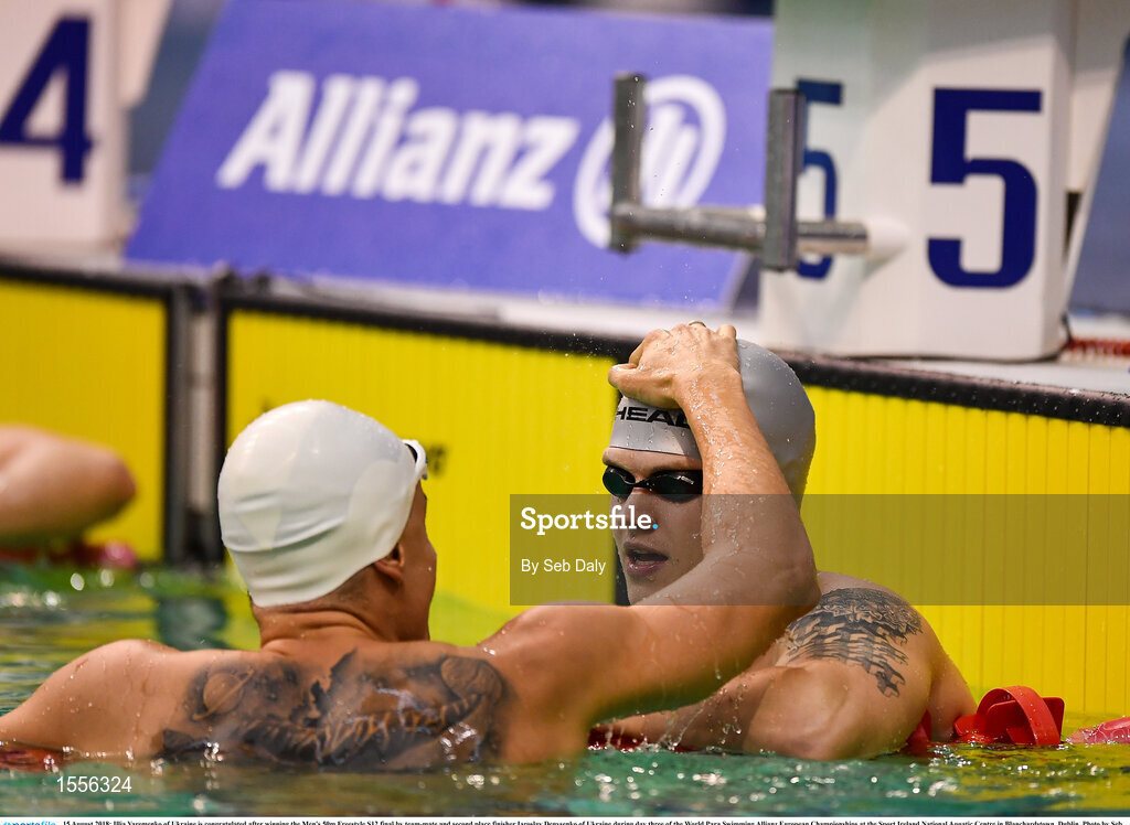 15 August 2018; Illia Yaremenko of Ukraine is congratulated after winning the Men's 50m Freestyle S12 final by team-mate and second place finisher Iaroslav Denysenko of Ukraine during day three of the World Para Swimming Allianz European Championships at the Sport Ireland National Aquatic Centre in Blanchardstown, Dublin. Photo by Seb Daly/Sportsfile