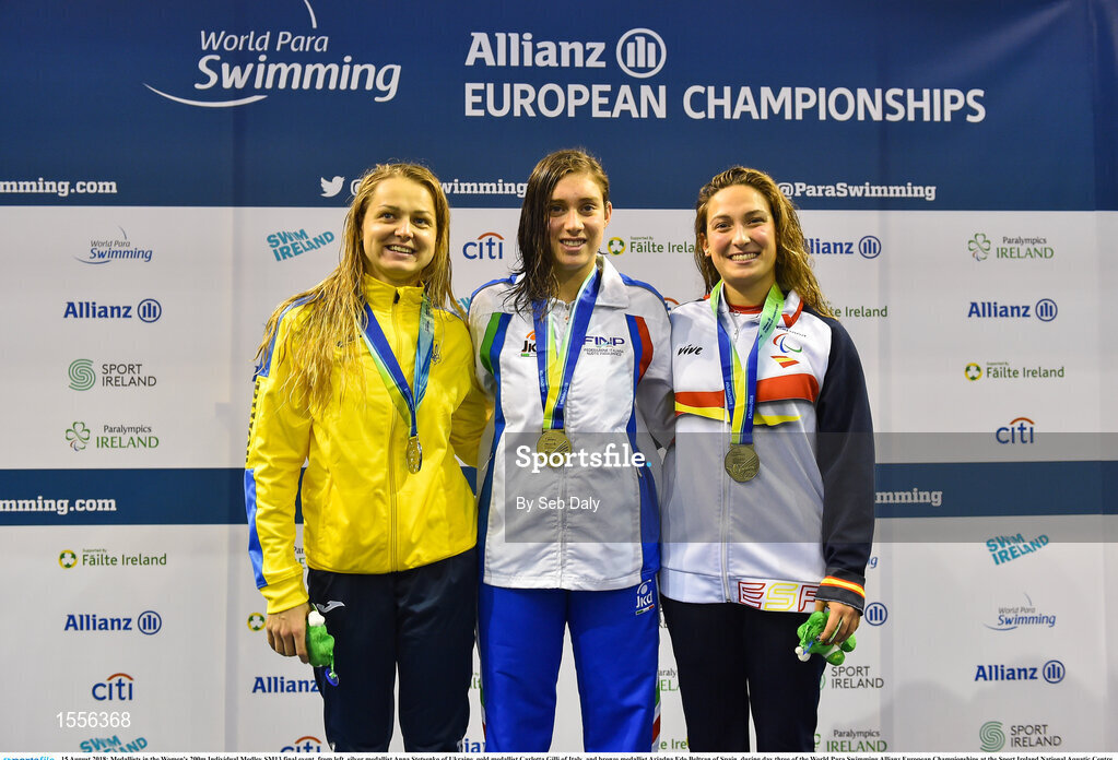 15 August 2018; Medallists in the Women's 200m Individual Medley SM13 final event, from left, silver medallist Anna Stetsenko of Ukraine, gold medallist Carlotta Gilli of Italy, and bronze medallist Ariadna Edo Beltran of Spain, during day three of the World Para Swimming Allianz European Championships at the Sport Ireland National Aquatic Centre in Blanchardstown, Dublin.  Photo by Seb Daly/Sportsfile