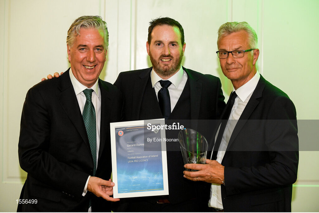 15 August 2018; Gerard Dunne is presented with their certificate by John Delaney, left, CEO, Football Association of Ireland and Ruud Dokter, FAI High Performance Director, during the UEFA Pro Licence Graduation at the Rochestown Park Hotel in Rochestown Rd, Douglas, Co. Cork Photo by Eóin Noonan/Sportsfile