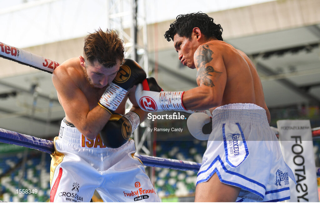 18 August 2018; Isaac Lowe, left, in action against Jose Hernandez during their featherweight bout at Windsor Park in Belfast. Photo by Ramsey Cardy/Sportsfile