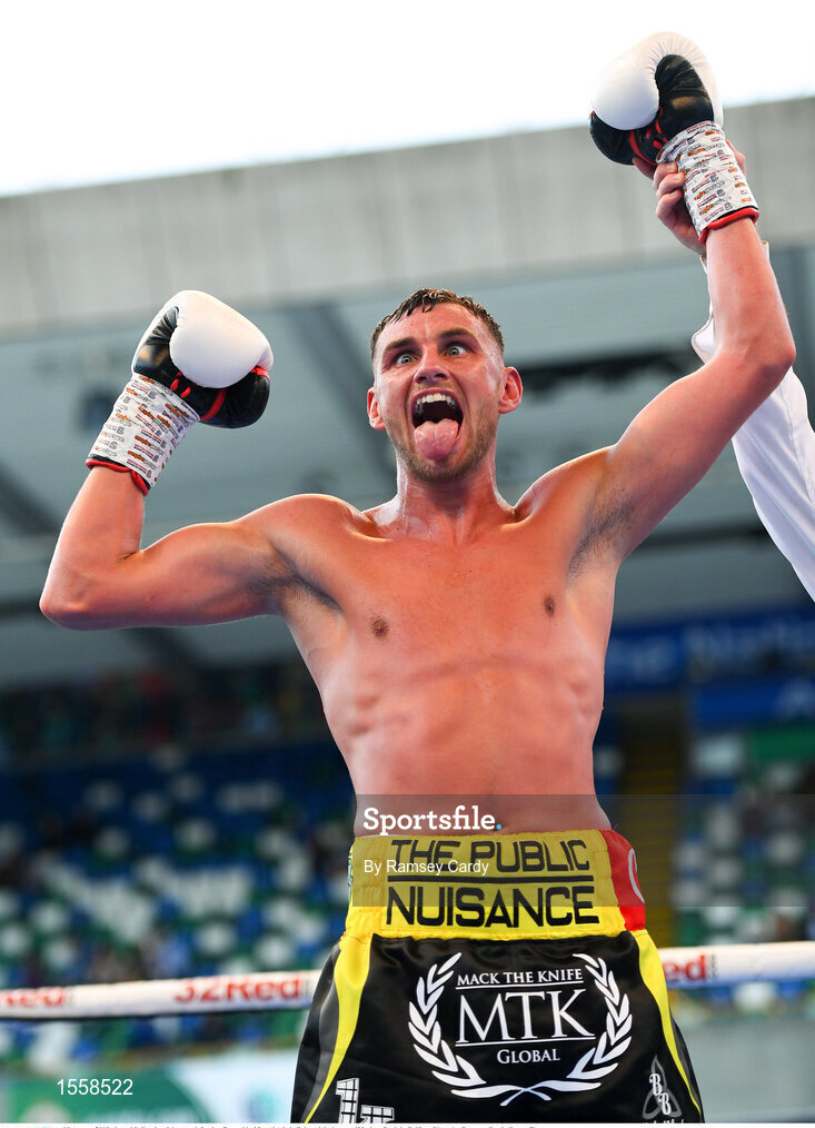 18 August 2018; Sean McComb celebrates defeating Reynaldo Mora in their lightweight bout at Windsor Park in Belfast. Photo by Ramsey Cardy/Sportsfile