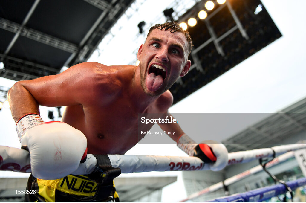 18 August 2018; Sean McComb celebrates defeating Reynaldo Mora in their lightweight bout at Windsor Park in Belfast. Photo by Ramsey Cardy/Sportsfile