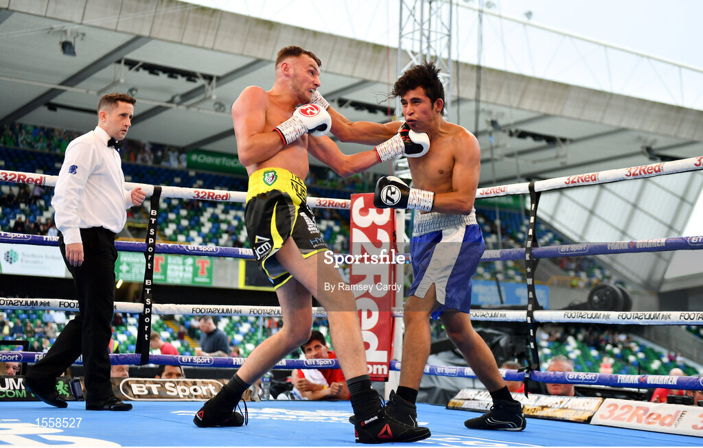 18 August 2018; Sean McComb, left, in action against Reynaldo Mora during their lightweight bout at Windsor Park in Belfast. Photo by Ramsey Cardy/Sportsfile