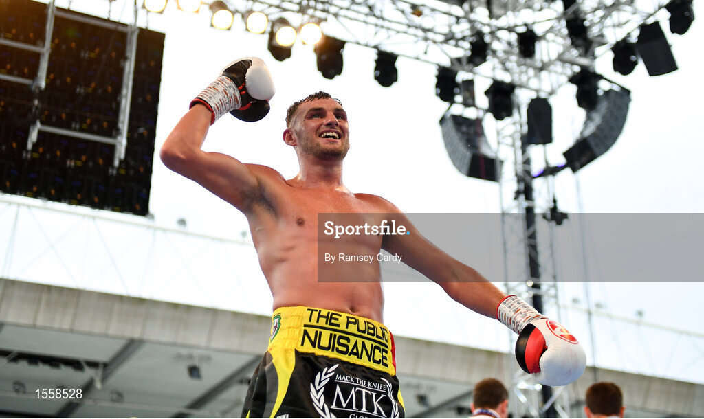 18 August 2018; Sean McComb celebrates defeating Reynaldo Mora in their lightweight bout at Windsor Park in Belfast. Photo by Ramsey Cardy/Sportsfile