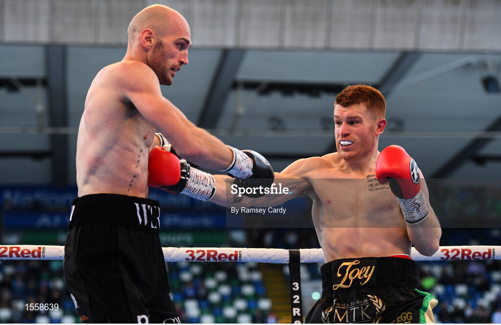 18 August 2018; Steve Collins Jr, right, in action against Steven Ward during their cruiserweight bout at Windsor Park in Belfast. Photo by Ramsey Cardy/Sportsfile