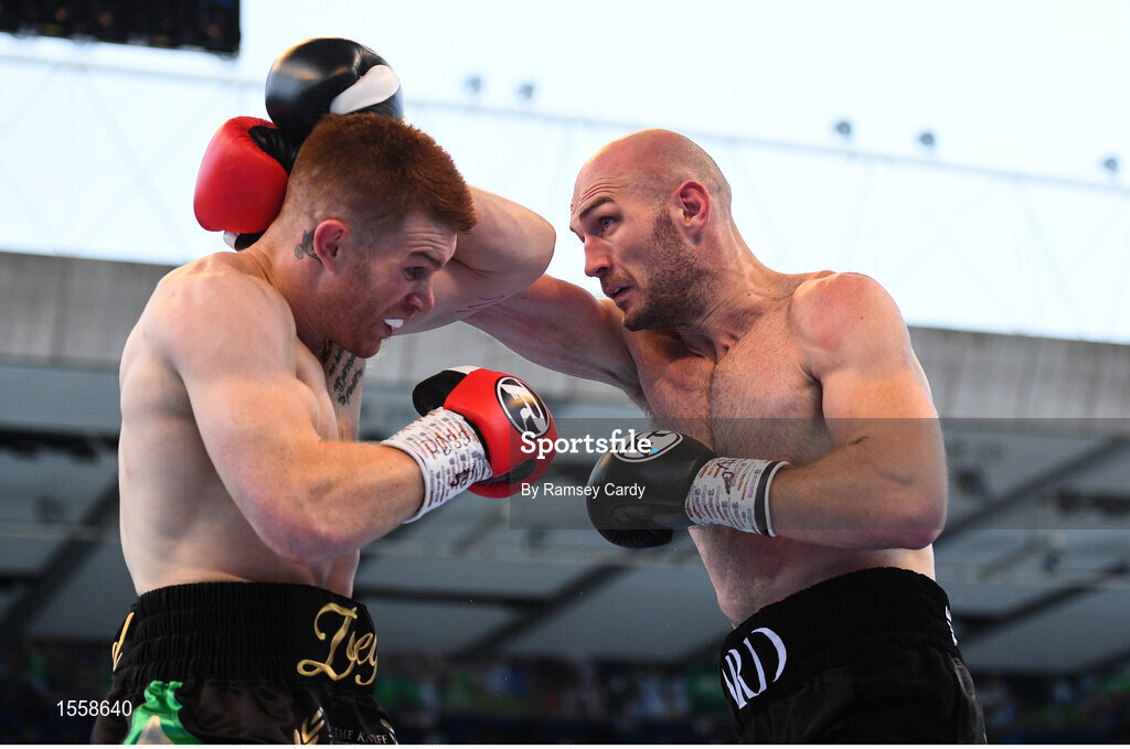 18 August 2018; Steve Collins Jr, left, in action against Steven Ward during their cruiserweight bout at Windsor Park in Belfast. Photo by Ramsey Cardy/Sportsfile