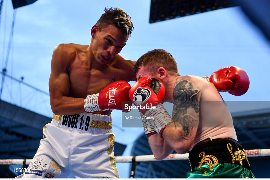 18 August 2018; Cristofer Rosales, left, in action against Paddy Barnes during their WBO World Flyweight Title bout at Windsor Park in Belfast. Photo by Ramsey Cardy/Sportsfile