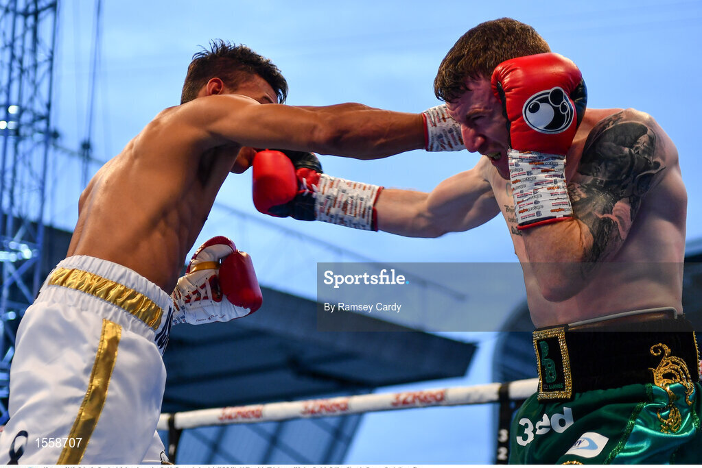 18 August 2018; Cristofer Rosales, left, in action against Paddy Barnes during their WBO World Flyweight Title bout at Windsor Park in Belfast. Photo by Ramsey Cardy/Sportsfile