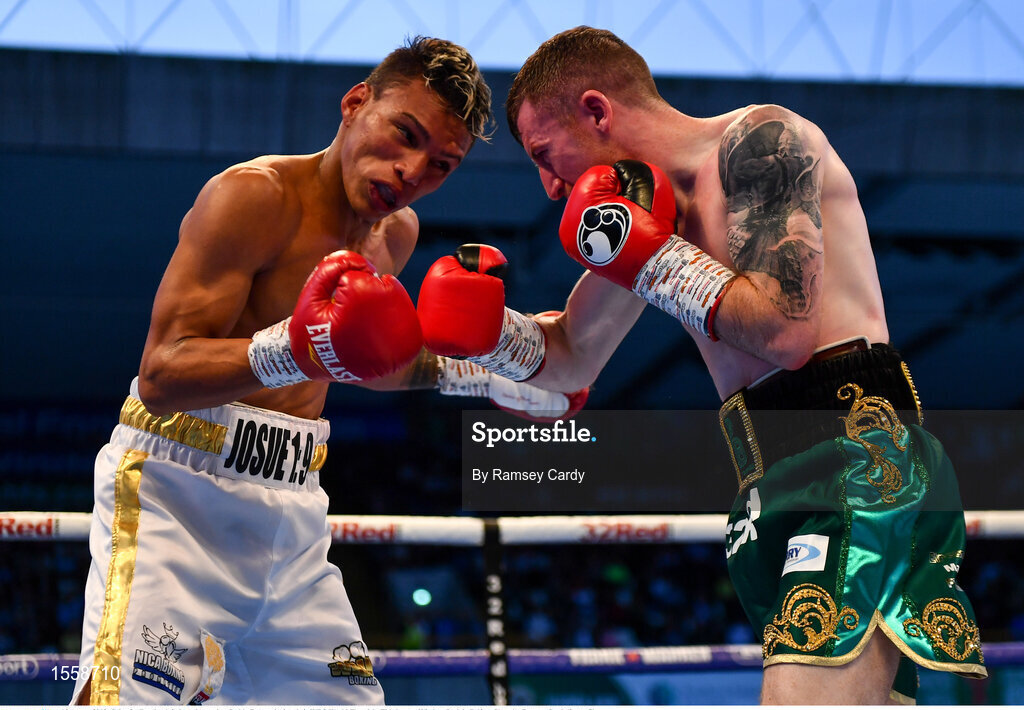 18 August 2018; Cristofer Rosales, left, in action against Paddy Barnes during their WBO World Flyweight Title bout at Windsor Park in Belfast. Photo by Ramsey Cardy/Sportsfile