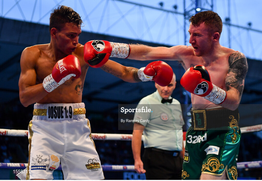 18 August 2018; Cristofer Rosales, left, in action against Paddy Barnes during their WBO World Flyweight Title bout at Windsor Park in Belfast. Photo by Ramsey Cardy/Sportsfile