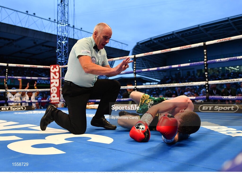 18 August 2018; Paddy Barnes is counted out by the Referee during his WBO World Flyweight Title bout against Cristofer Rosales at Windsor Park in Belfast. Photo by Ramsey Cardy/Sportsfile