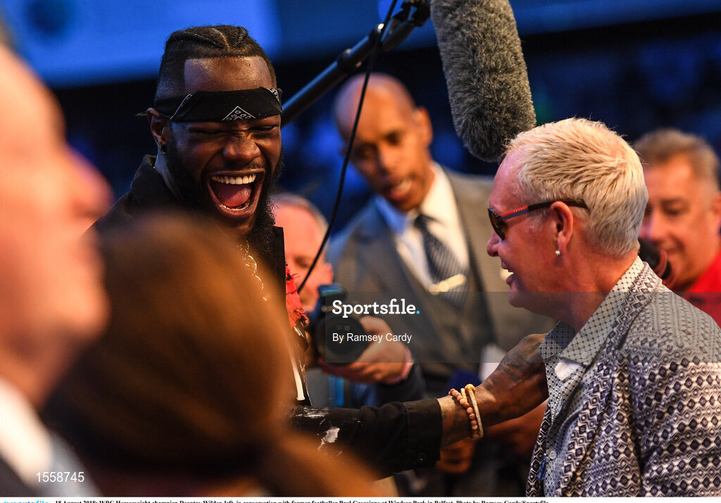 18 August 2018; WBC Heavyweight champion Deontay Wilder, left, in conversation with former footballer Paul Gascoigne at Windsor Park in Belfast. Photo by Ramsey Cardy/Sportsfile