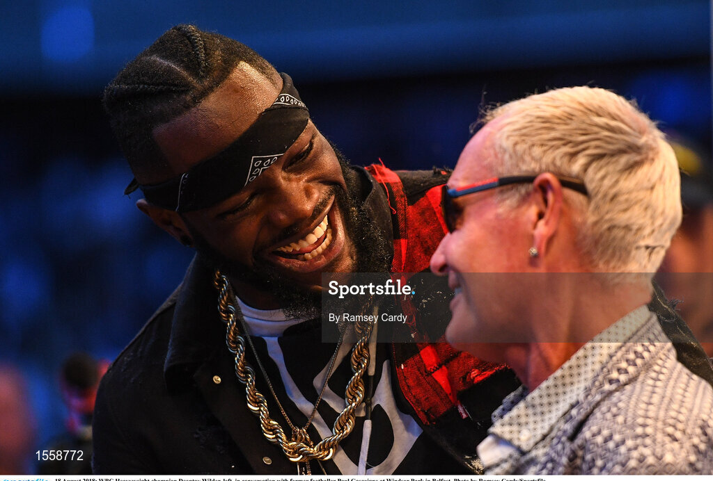 18 August 2018; WBC Heavyweight champion Deontay Wilder, left, in conversation with former footballer Paul Gascoigne at Windsor Park in Belfast. Photo by Ramsey Cardy/Sportsfile