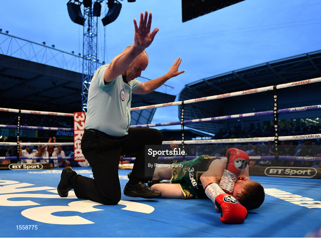 18 August 2018; Paddy Barnes is counted out by the Referee during his WBO World Flyweight Title bout against Cristofer Rosales at Windsor Park in Belfast. Photo by Ramsey Cardy/Sportsfile
