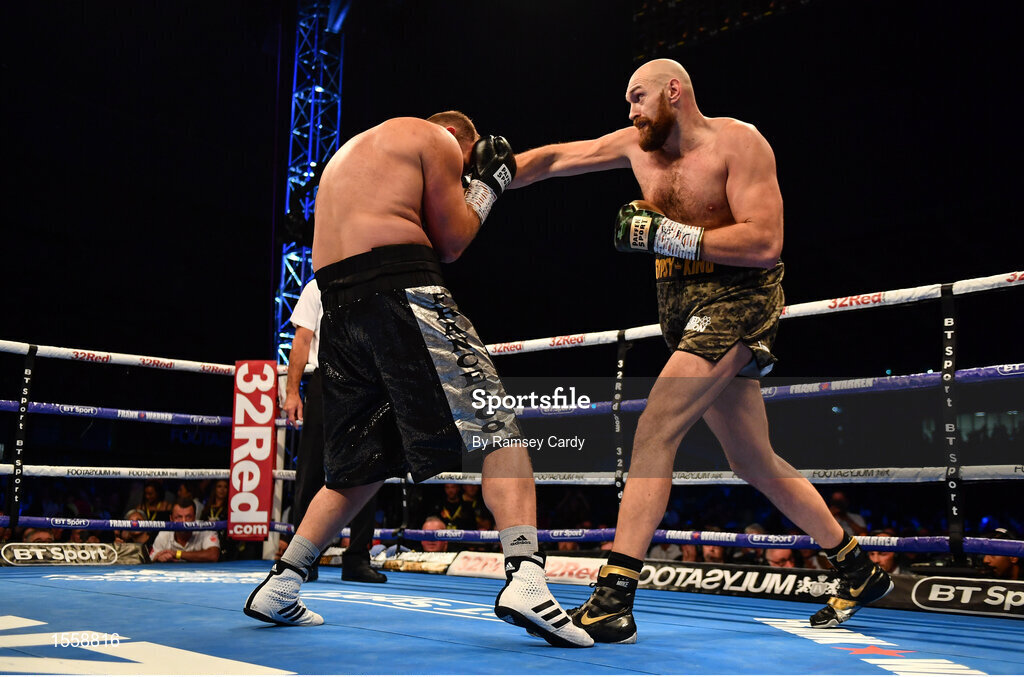18 August 2018; Tyson Fury, right, in action against Francesco Pianeta during their heavyweight bout at Windsor Park in Belfast. Photo by Ramsey Cardy/Sportsfile