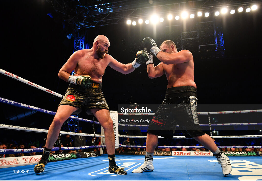 18 August 2018; Tyson Fury, left, in action against Francesco Pianeta during their heavyweight bout at Windsor Park in Belfast. Photo by Ramsey Cardy/Sportsfile