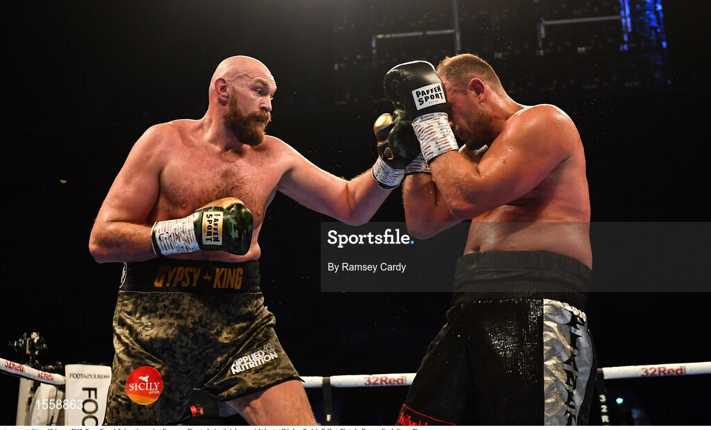 18 August 2018; Tyson Fury, left, in action against Francesco Pianeta during their heavyweight bout at Windsor Park in Belfast. Photo by Ramsey Cardy/Sportsfile