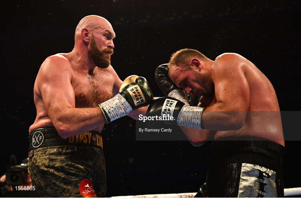 18 August 2018; Tyson Fury, left, in action against Francesco Pianeta during their heavyweight bout at Windsor Park in Belfast. Photo by Ramsey Cardy/Sportsfile