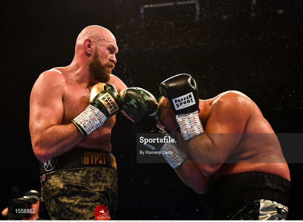 18 August 2018; Tyson Fury, left, in action against Francesco Pianeta during their heavyweight bout at Windsor Park in Belfast. Photo by Ramsey Cardy/Sportsfile