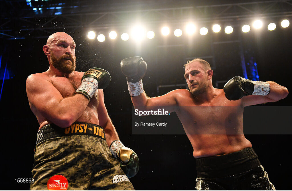 18 August 2018; Tyson Fury, left, in action against Francesco Pianeta during their heavyweight bout at Windsor Park in Belfast. Photo by Ramsey Cardy/Sportsfile