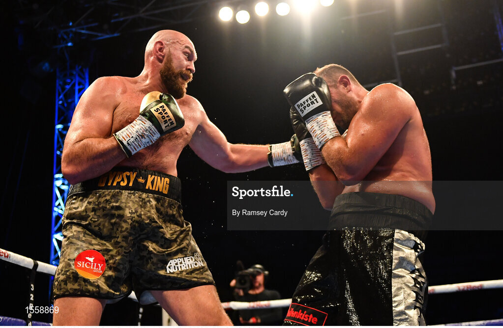 18 August 2018; Tyson Fury, left, in action against Francesco Pianeta during their heavyweight bout at Windsor Park in Belfast. Photo by Ramsey Cardy/Sportsfile