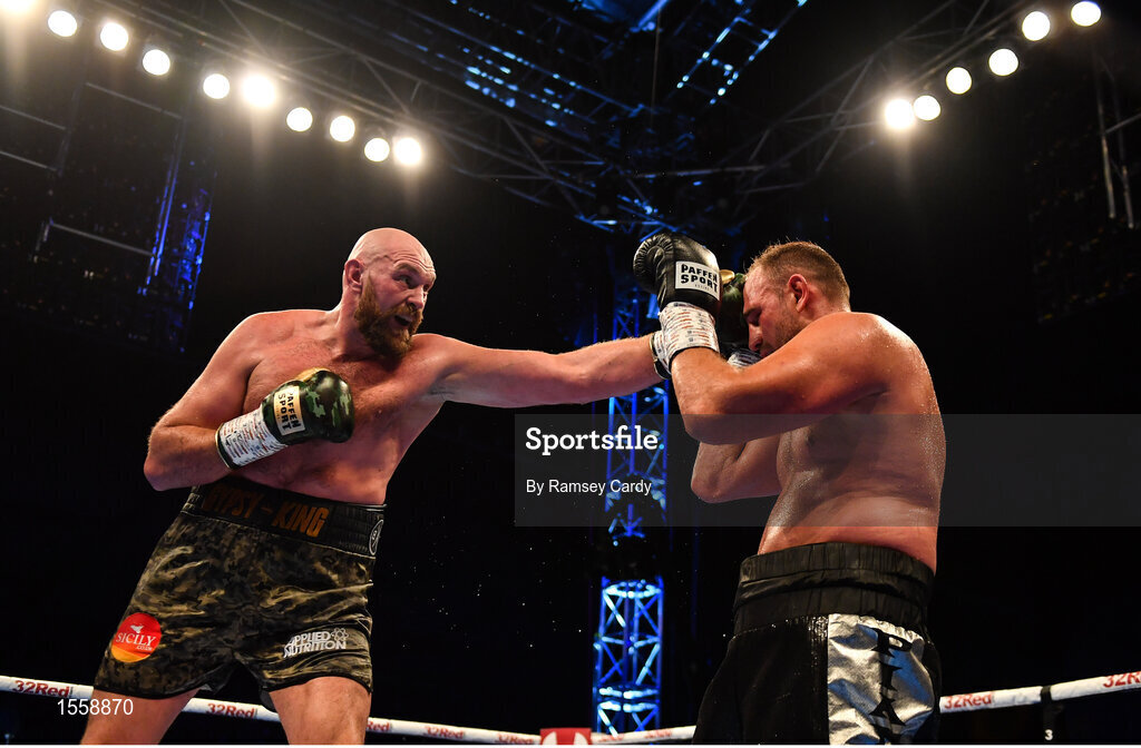 18 August 2018; Tyson Fury, left, in action against Francesco Pianeta during their heavyweight bout at Windsor Park in Belfast. Photo by Ramsey Cardy/Sportsfile