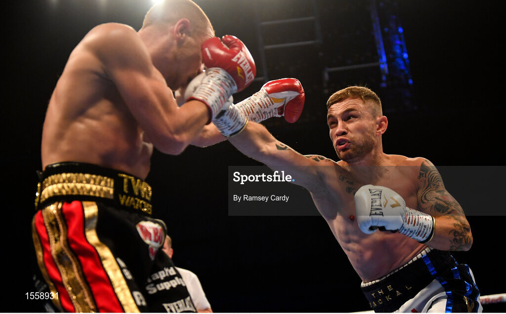 18 August 2018; Carl Frampton, right, in action against Luke Jackson during their interim World Boxing Organisation World Featherweight Title bout at Windsor Park in Belfast. Photo by Ramsey Cardy/Sportsfile