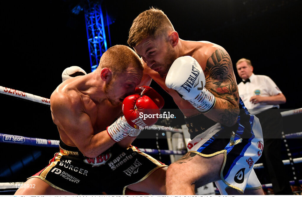 18 August 2018; Carl Frampton, right, in action against Luke Jackson during their interim World Boxing Organisation World Featherweight Title bout at Windsor Park in Belfast. Photo by Ramsey Cardy/Sportsfile