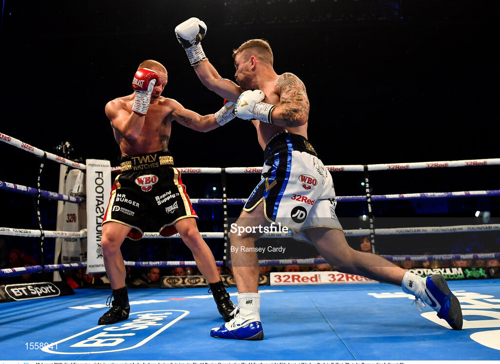 18 August 2018; Carl Frampton, right, in action against Luke Jackson during their interim World Boxing Organisation World Featherweight Title bout at Windsor Park in Belfast. Photo by Ramsey Cardy/Sportsfile