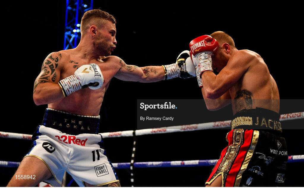 18 August 2018; Carl Frampton, left, in action against Luke Jackson during their interim World Boxing Organisation World Featherweight Title bout at Windsor Park in Belfast. Photo by Ramsey Cardy/Sportsfile