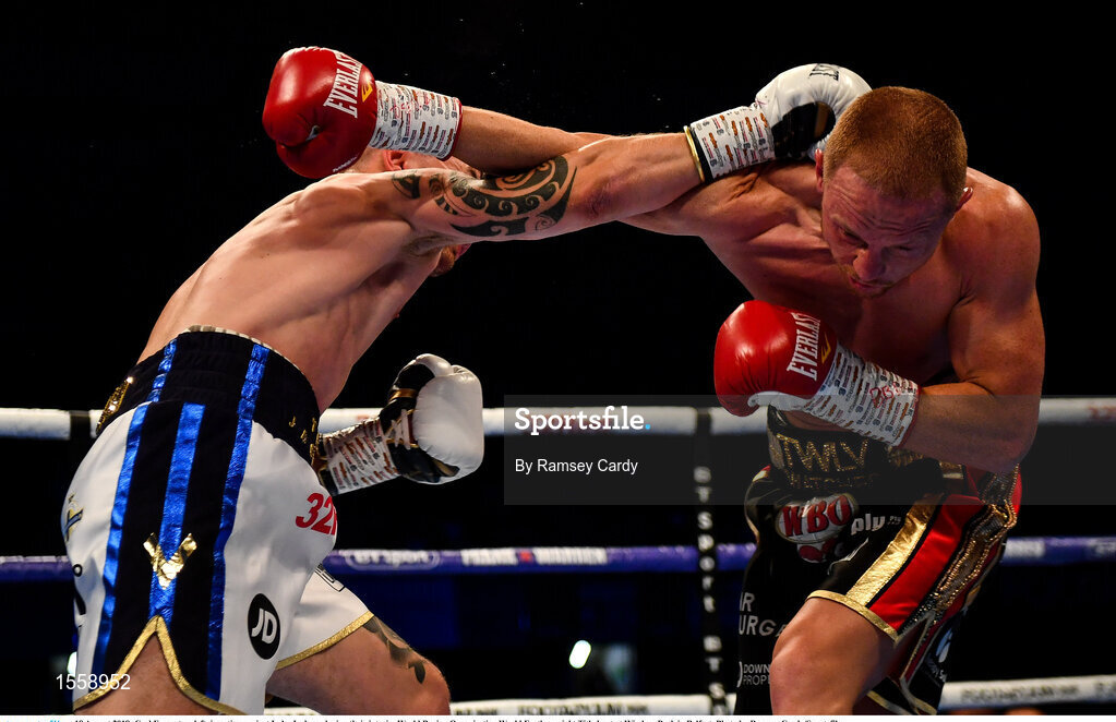 18 August 2018; Carl Frampton, left, in action against Luke Jackson during their interim World Boxing Organisation World Featherweight Title bout at Windsor Park in Belfast. Photo by Ramsey Cardy/Sportsfile