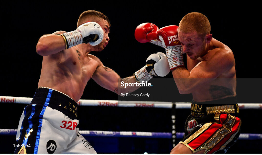18 August 2018; Carl Frampton, left, in action against Luke Jackson during their interim World Boxing Organisation World Featherweight Title bout at Windsor Park in Belfast. Photo by Ramsey Cardy/Sportsfile