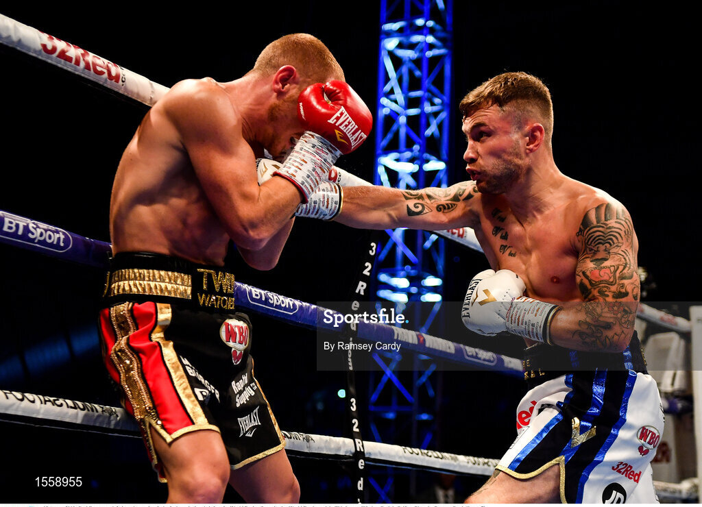 18 August 2018; Carl Frampton, left, in action against Luke Jackson during their interim World Boxing Organisation World Featherweight Title bout at Windsor Park in Belfast. Photo by Ramsey Cardy/Sportsfile