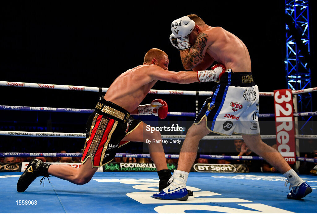 18 August 2018; Luke Jackson, left, in action against Carl Frampton during their interim World Boxing Organisation World Featherweight Title bout at Windsor Park in Belfast. Photo by Ramsey Cardy/Sportsfile