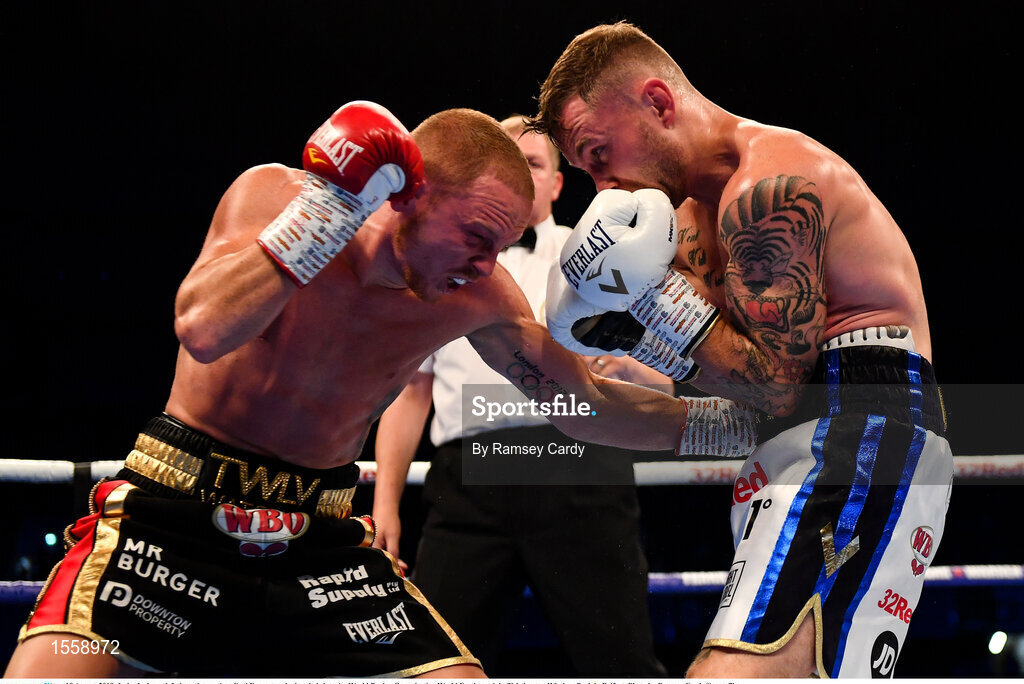 18 August 2018; Luke Jackson, left, in action against Carl Frampton during their interim World Boxing Organisation World Featherweight Title bout at Windsor Park in Belfast. Photo by Ramsey Cardy/Sportsfile