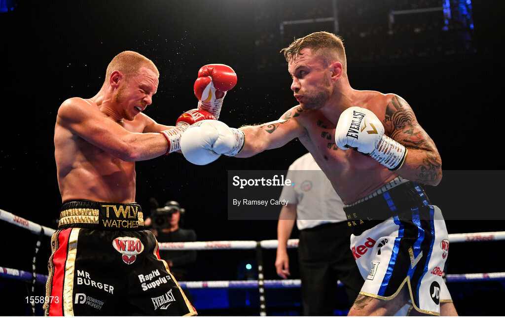 18 August 2018; Carl Frampton, right, in action against Luke Jackson during their interim World Boxing Organisation World Featherweight Title bout at Windsor Park in Belfast. Photo by Ramsey Cardy/Sportsfile