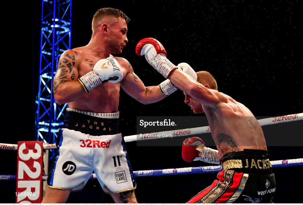 18 August 2018; Carl Frampton, left, in action against Luke Jackson during their interim World Boxing Organisation World Featherweight Title bout at Windsor Park in Belfast. Photo by Ramsey Cardy/Sportsfile