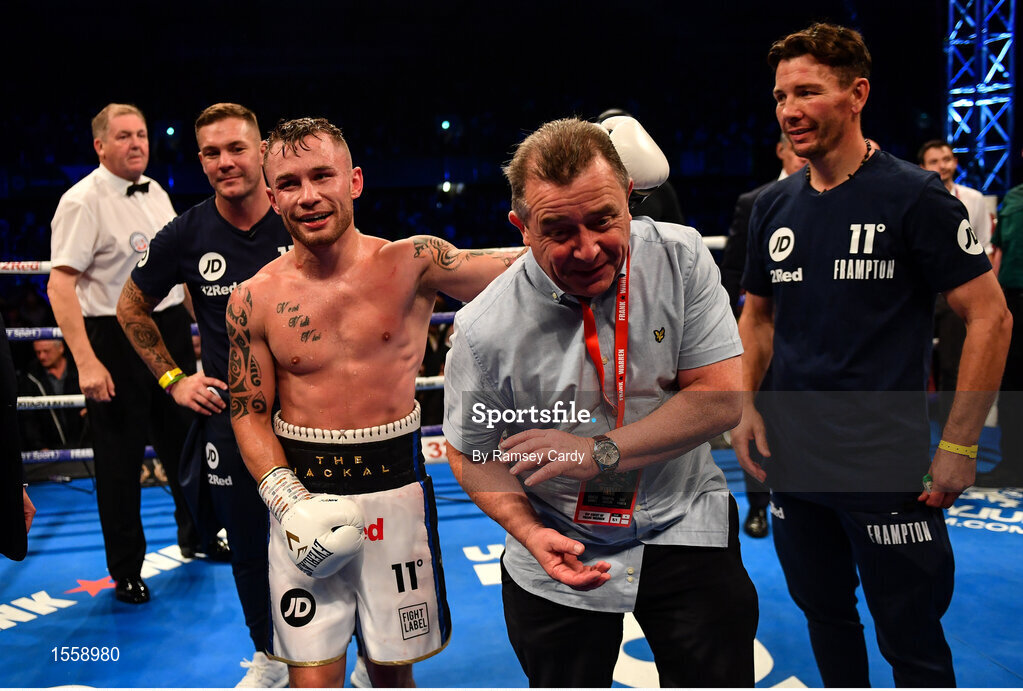 18 August 2018; Carl Frampton celebrates his victory against Luke Jackson with father Craig following their interim World Boxing Organisation World Featherweight Title bout at Windsor Park in Belfast. Photo by Ramsey Cardy/Sportsfile