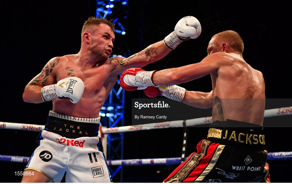 18 August 2018; Carl Frampton, left, in action against Luke Jackson during their interim World Boxing Organisation World Featherweight Title bout at Windsor Park in Belfast. Photo by Ramsey Cardy/Sportsfile