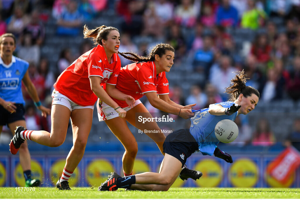 16 September 2018; Lyndsey Davey of Dublin is fouled by Eimear Meaney and Shauna Kelly of Cork resulting in a penalty during the TG4 All-Ireland Ladies Football Senior Championship Final match between Cork and Dublin at Croke Park, Dublin. Photo by Brendan Moran/Sportsfile