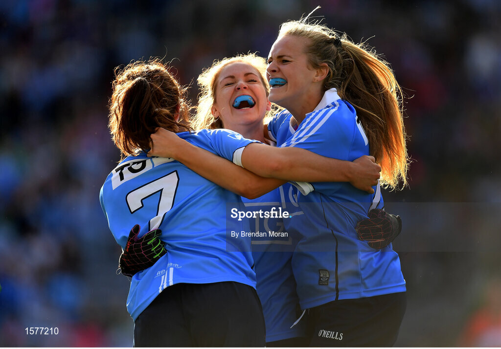16 September 2018; Dublin players, from left, Niamh Collins, Sinéad Finnegan and Amy Connolly celebrate at the final whistle of the TG4 All-Ireland Ladies Football Senior Championship Final match between Cork and Dublin at Croke Park, Dublin. Photo by Brendan Moran/Sportsfile