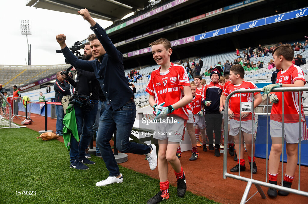 22 September 2018; The 2 Johnnies run out to the pitch with players from Bohola Moy Davitts, Co. Mayo during the Littlewoods Ireland Connacht Provincial Days Go Games in Croke Park. This year over 6,000 boys and girls aged between six and eleven represented their clubs in a series of mini blitzes and – just like their heroes – got to play in Croke Park. For exclusive content and behind the scenes action follow Littlewoods Ireland on Facebook, Instagram, Twitter and https://blog.littlewoodsireland.ie/ Photo by Eóin Noonan/Sportsfile