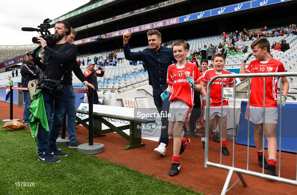 22 September 2018; The 2 Johnnies run out to the pitch with players from Bohola Moy Davitts, Co. Mayo during the Littlewoods Ireland Connacht Provincial Days Go Games in Croke Park. This year over 6,000 boys and girls aged between six and eleven represented their clubs in a series of mini blitzes and – just like their heroes – got to play in Croke Park. For exclusive content and behind the scenes action follow Littlewoods Ireland on Facebook, Instagram, Twitter and https://blog.littlewoodsireland.ie/ Photo by Eóin Noonan/Sportsfile