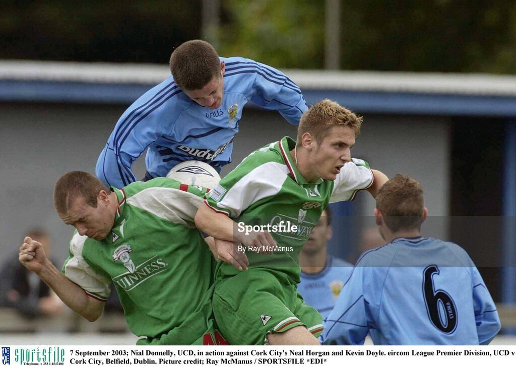 7 September 2003; Nial Donnelly, UCD, in action against Cork City's Neal Horgan and Kevin Doyle. eircom League Premier Division, UCD v Cork City, Belfield, Dublin. Picture credit; Ray McManus / SPORTSFILE *EDI*