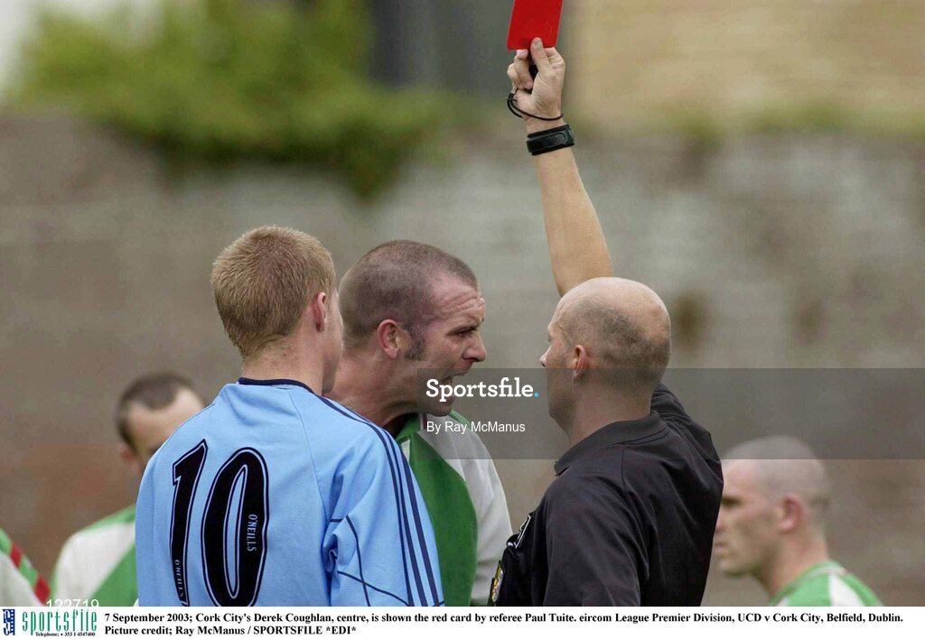7 September 2003; Cork City's Derek Coughlan, centre, is shown the red card by referee Paul Tuite. eircom League Premier Division, UCD v Cork City, Belfield, Dublin. Picture credit; Ray McManus / SPORTSFILE *EDI*