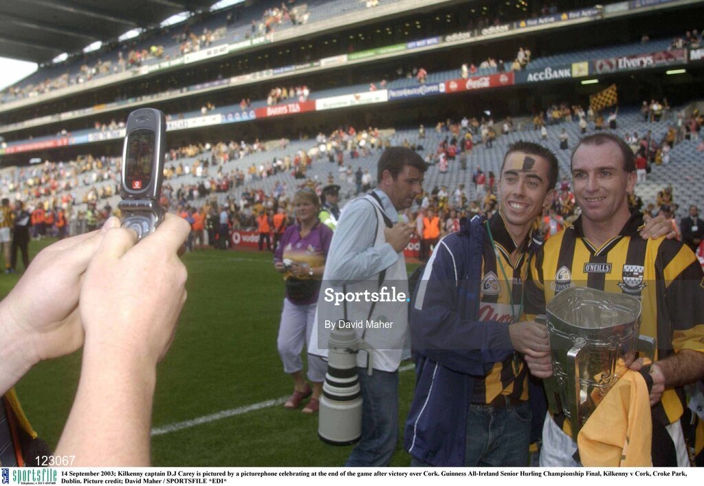14 September 2003; Kilkenny captain D.J Carey is pictured by a picturephone celebrating at the end of the game after victory over Cork. Guinness All-Ireland Senior Hurling Championship Final, Kilkenny v Cork, Croke Park, Dublin. Picture credit; David Maher / SPORTSFILE *EDI*